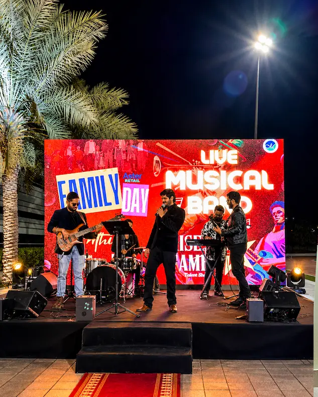 Outdoor LED screen displaying content at a live outdoor event